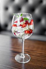 Aperitif is a refreshing cocktail of lemonade made from citrus slices. Soft drink with syrup and soda and ice cubes. Concept - summer thirst