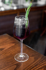 Aperitif is a refreshing cocktail of lemonade made from citrus slices. Soft drink with syrup and soda and ice cubes. Concept - summer thirst