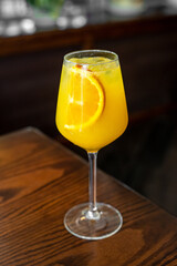 Aperitif is a refreshing cocktail of lemonade made from citrus slices. Soft drink with syrup and soda and ice cubes. Concept - summer thirst