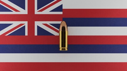 Top down view of a 9mm bullet in the center and on top of the US state flag of Hawaii