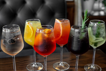 Aperitif is a refreshing cocktail of lemonade made from citrus slices. Soft drink with syrup and soda and ice cubes. Concept - summer thirst