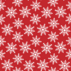 Beautiful white ink snowflakes isolated on red background. Cute monochrome festive new year seamless pattern. Vector simple flat graphic hand drawn illustration. Texture.