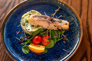 European Mediterranean salad of seasonal vegetables. Salad of tomatoes, cucumbers and fresh herbs with olive oil. Concept menu of summer cafe