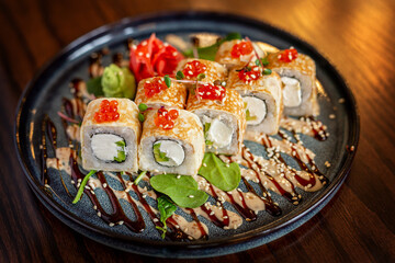 European rolls with rice and nori. composition of rolls: salmon, tuna, avocado, shrimp. Concept menu of summer cafe