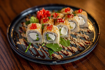 European rolls with rice and nori. composition of rolls: salmon, tuna, avocado, shrimp. Concept menu of summer cafe