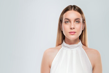 Photo of a Girl with light natural eye makeup in white sleeveless T-shirt. Beauty face young woman...