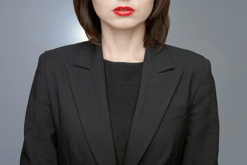 Close-up of businesswoman in black blazer