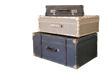 Stack of a vintage leather various color suitcases isolated on white background