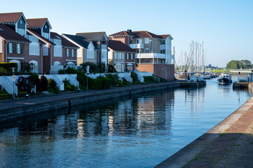 Obraz premium View on houses and water in Wemeldinge, Zeeland, Netherlands