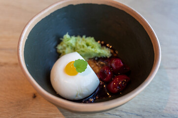 Tasty lemon mousse cream with sour cherry dessert