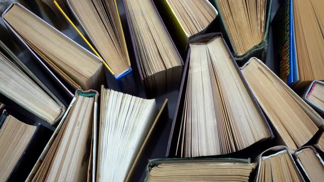 Book background. Old books in the library. Bookshelf shop. Bookish bookstore, bookshop.