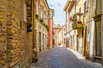 Fototapeta na wymiar Streets and alleys in old town of Atri, medieval pearl near Teramo, Abruzzo, Italy. It's one of the oldest medieval town in Abruzzo