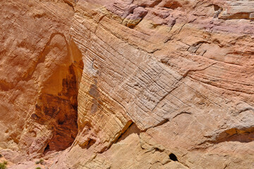 Colorful rock faces and caves in the Nevada Desert built into the sandstone