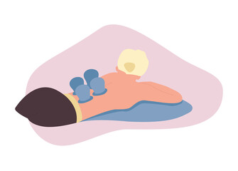 Woman attending cupping therapy session. Female patient with heated cups on low back. For topics like alternative medicine, chronic pain, rehabilitation 