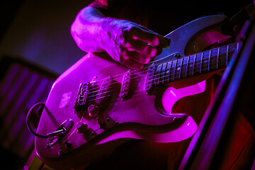 electric guitar on purple