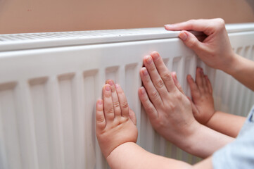 Baby hands measure battery temperature. Usually, the heating season in Ukraine starts either from October 15th and finishes on April 15th or it can start if the temperature is below 8C outside.