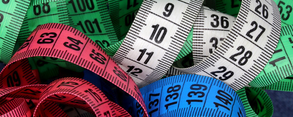 close-up colorful measuring tapes background
