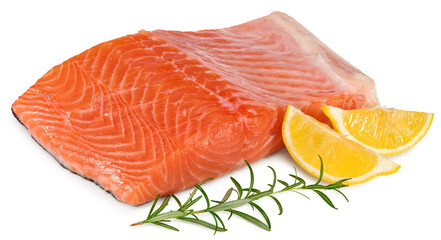 Red fish. Raw salmon fillet with rosemary and lemon isolate on white background. Clipping path and full depth of field