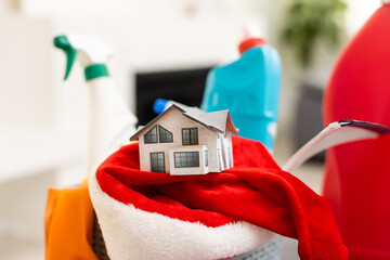 Minimal Christmas background with household chemicals. Plastic. Happy New Year. House and apartment...