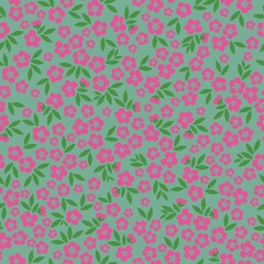 Seamless floral pattern. Fashionable background of wonderful pink flowers and green leaves. flowers scattered on a green background. Stock vector for printing on surfaces and web design.