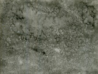 Light watercolor textured background of silver-black color with speckles. Salt Effects