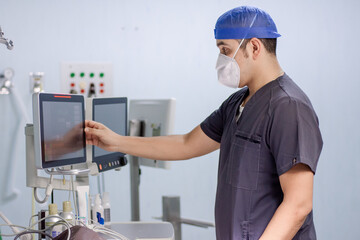 young adult doctor preparing for surgery