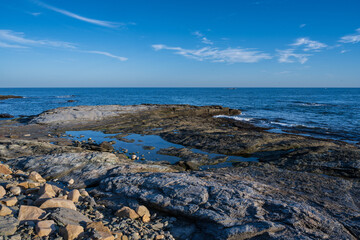 Fototapeta na wymiar A Rocky Beach in Newport Rhode Island