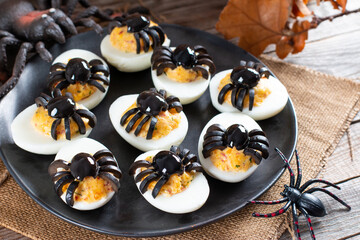 Deviled Eggs With A Spider For Halloween Party. Fun food for kids. Halloween Dish