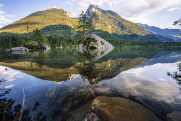 Fototapeta premium Hintersee Lake with reflection of Watzmann mountain peaks. Ramsau Berchtesgaden Bavaria, Germany, Europe