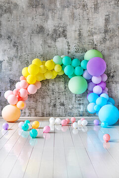 Fototapeta Arch of colored balloons on a holiday. Copy space for text. Vertical photo