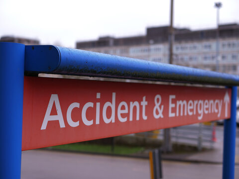 Accident And Emergency Sign With British NHS Hospital 