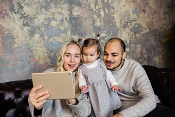 Family calling to friends with online