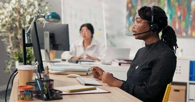 Call center office, insurance company, telecommunications, customer advisor, employees sit with headphones and microphones on their ears, conduct consultations, conversations