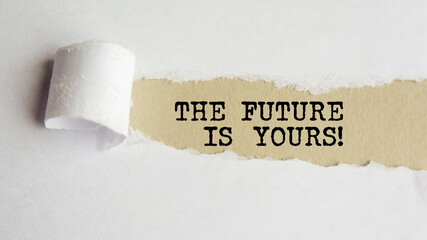 the future is yours. words. text on grey paper on torn paper background