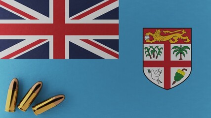 Three 9mm bullets in the bottom left corner on top of the national flag of Fiji