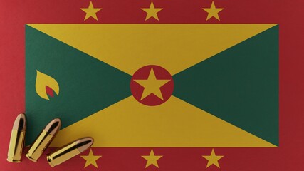 Three 9mm bullets in the bottom left corner on top of the national flag of Grenada