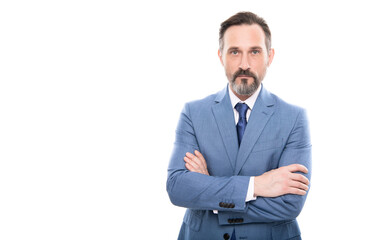 confident boss with graying hair. copy space. grizzled businessman crossed hands.