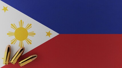 Three 9mm bullets in the bottom left corner on top of the national flag of Philippines