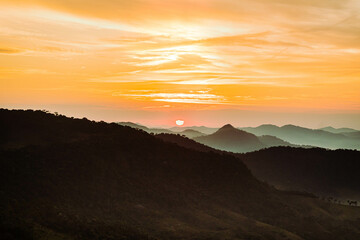 blue sky and yellow sun background with white clouds.