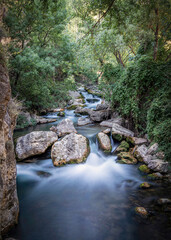 Obraz premium Rio Castril falling through the rocks in the Cerrada del Rio Castril, in the Andalusia community, Granada, Spain.