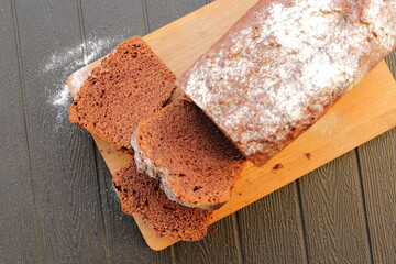 fresh spice cake with powdered sugar 