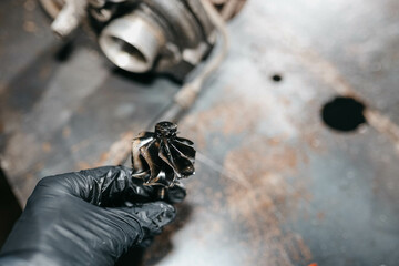 diagnostics and repair of a turbine of a car engine, a turbocharger.