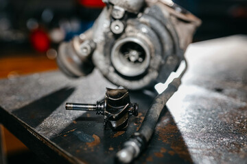 diagnostics and repair of a turbine of a car engine, a turbocharger.