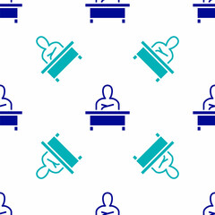 Blue Schoolboy sitting at desk icon isolated seamless pattern on white background. Vector