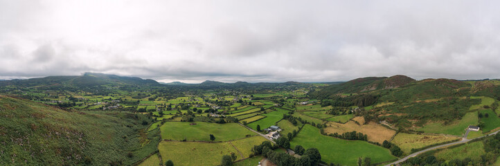 Fototapeta premium Panoramic aerial view cloudy summer countryside,newry,Northern Ireland