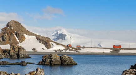 Antarctic landscape with mountains and argentinian Camara base station, Half Moon island, Antarctic peninsula