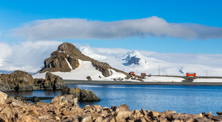Antarctic landscape with mountains and argentinian Camara base station, Half Moon island, Antarctic peninsula