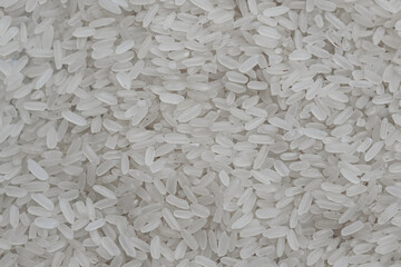 Raw rice. Background of rice texture. Healthy and sports nutrition.