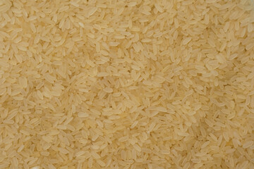 Raw rice. Background of rice texture. Healthy and sports nutrition.