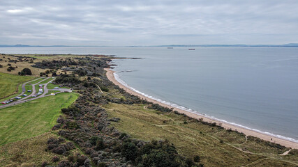 Gullane Beach Coastal Line. Gullane  is a town on the southern shore of the Firth of Forth